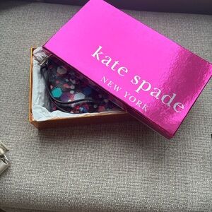 Kate Spade wristlet. Mint condition with tags